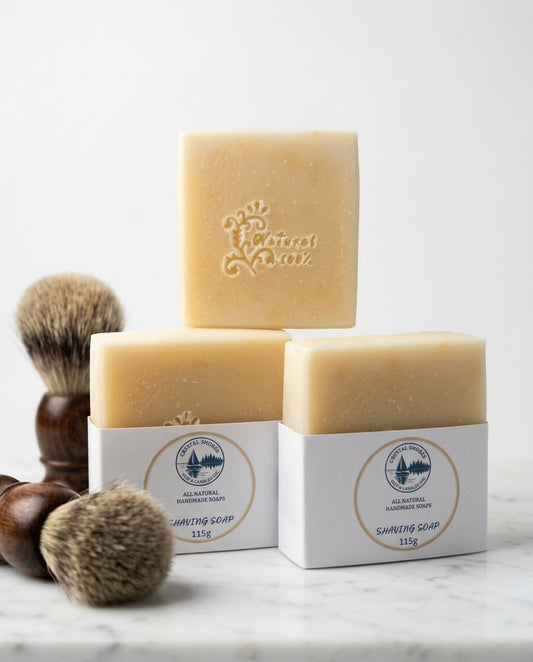 Shaving Soap — handmade soap on marble with a wooden shaving brush